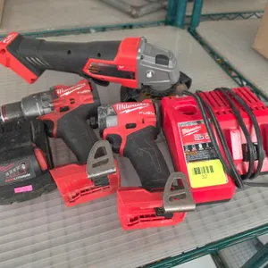 Milwaukee 2880-20 Angle Grinder, 2904-20 Hammer Drill, 2953-20 Impact Driver, M18 RedLithium XC5.0 Battery and Charger