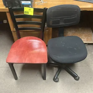 Two-piece chair lot. Includes (1) ladder-back side chair featuring a black metal frame with a reddish-brown wooden seat, and (1) rolling office task c