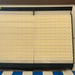 8'L laminate card merchandiser. Features multi-tiered greeting card display racks with cream-colored shelving. Built on a dark metal frame with a matc