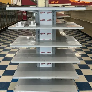 Metal multi-tier merchandiser display rack. Features a double-sided freestanding design with adjustable shelves and Little Debbie branding on the cent