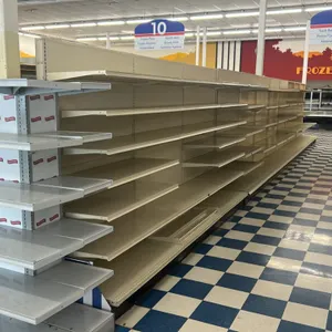 88'L of Lozier gondola shelving. Features 77"H uprights with 22"D base shelves, adjustable upper shelves, beige finish, and pegboard backing sections 