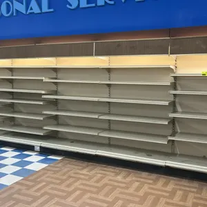 76'L of Lozier metal wall shelving. Features 80"H uprights with 22"D base shelves and adjustable upper shelves. Cream-colored finish. Contents not inc