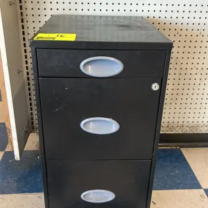 Metal 3-drawer pedestal filing cabinet. Features black finished metal construction with three drawers, including one shallow top drawer and two larger