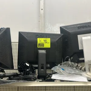 Dell LCD monitor lot. Includes (2) 17" monitors and (1) 19" monitor. Equipped with stands and assorted power and video cables.