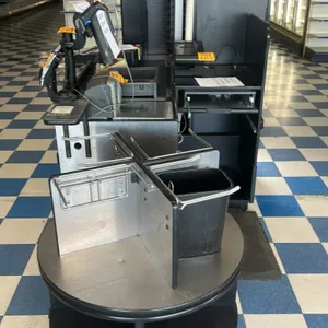 Stainless steel and laminate single belt check lane. Features a rotating bag stand. 8'L. Electrical: 115V. Note: All POS register equipment, monitors,