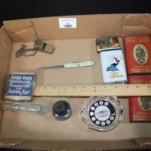 Brass Whistle, Super Pure Mentholated Coconut Oil Cup, Shaving Soap, Small Vintage Bottle, Three In One Advertising Pieces, And Two Prince Albert Cans