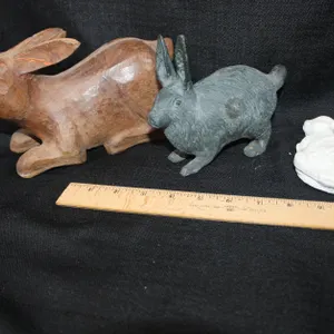 Wooden Rabbit, Cast Iron Rabbit, And Chalk Rabbit