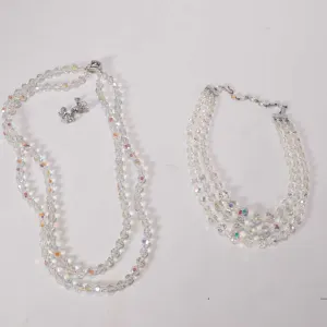 Pair of signed Sherman Austrian crystal earrings plus two unsigned beaded crystal necklaces includin