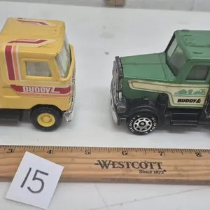 2 Buddy L Trucks