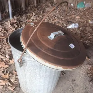 Small galvanized trash can and lid