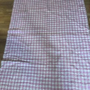 Whole cloth hand stitched pink check twin quilt