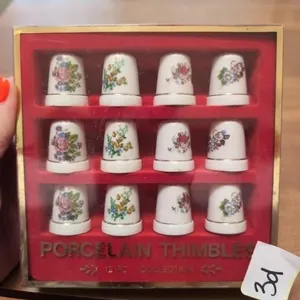 Vintage porcelain thimbles in box