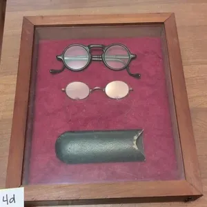 Shadow box of vintage glasses