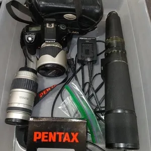 Pentax K200 camera, battery charger, 2 lenses,