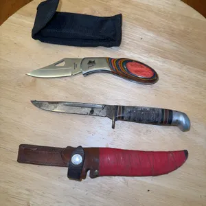 Pocket knives - (1) Western + (1) Pheasants Forever