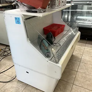 McCray display refrigerator, 52” wide, 30” deep, 44.5” height, plugged in and it ran, contents not included