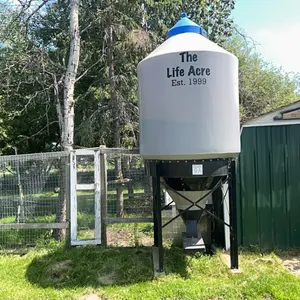 APPROX 12'H SMALL PLASTIC BOTTOM FEED BIN ON STAND