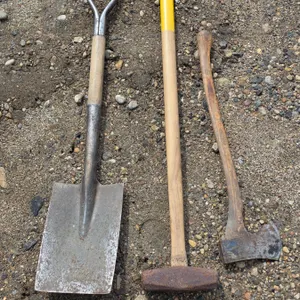 Assorted hand tools- sledge hammer, axe, shovel