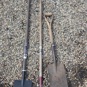 Assorted hand tools- rake, scraper, shovel