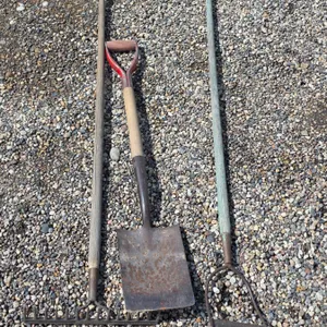 Assorted hand tools- shovel, rake