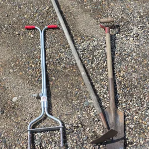 Assorted hand tools- hoe, shovel, air rater