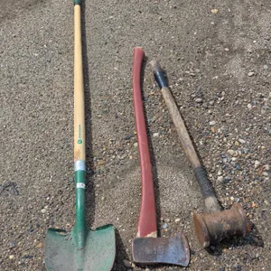 Assorted hand tools- sledge hammer, axe