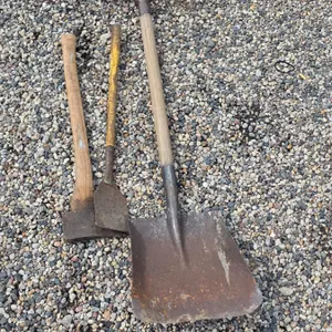 Assorted hand tools- axe, shovel