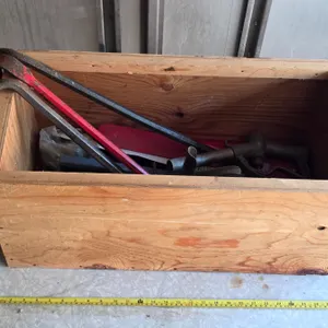 Wooden crate with tools- crowbars