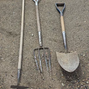 Assorted hand tools- pitch fork, hoe