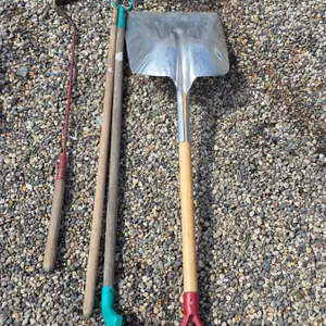 Assorted hand tools- shovel rake