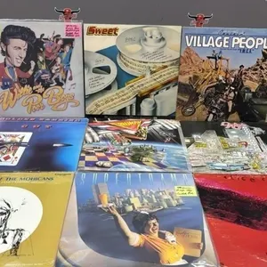 9 Asst. Record Albums.