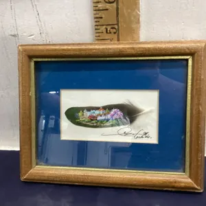SMALL PAINTING ON A FEATHER