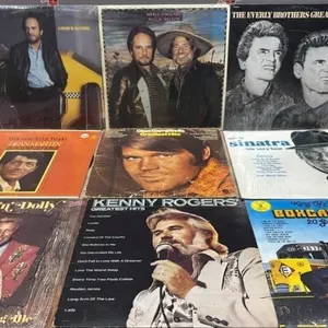 9 Asst. Record Albums.