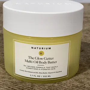 **APPEARS NEW** Naturium The Glow Getter Whipped Multi-Oil Body Butter - 7.7 fl. oz