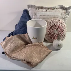 Pillows 2x, round tablecloths 68”, decorative trash can & hand soap pump