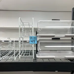 plastic display case 18” wide, 12” deep, 15” tall, and 3 can holders