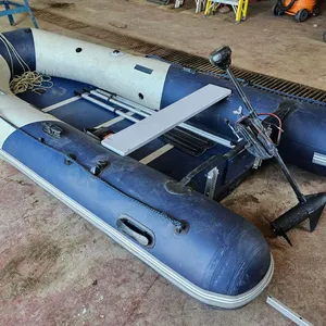 11' Zodiak Zoom Hard Floor Inflatable Boat w/ Minn Kota 55lbs Thrust Electric Motor, Aluminum Oars, 12v Air Pump & Transport Wheels