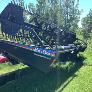 MacDon 25' header, pea auger, transport, fits most Macdon swathers, very little use, excellent condition, see lot details