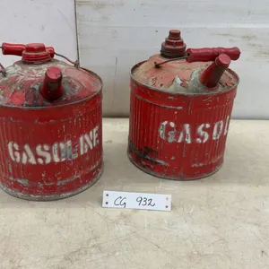Two Vintage “Gasoline” Metal Fuel Cans with Spouts and Handles