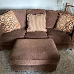 Brown Upholstered Sofa and Ottoman Set from Ashley's