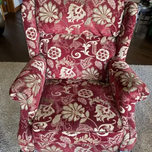 Upholstered Red and Gold Wingback Armchair