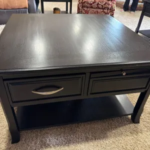Black Wooden Coffee Table by Ashley Furniture