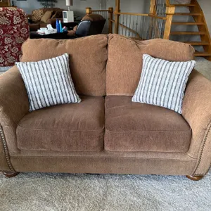 Ashley Furniture Love Seat with Nailhead Trim