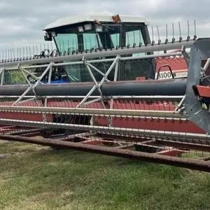 Hesston Model 810T SP Swather. 30FT Header, Pick