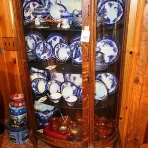 Antique bow front China cabinet