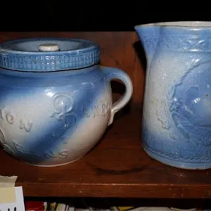 Salt glazed pitcher with swan