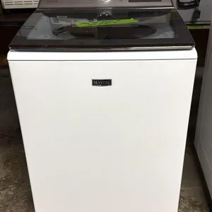 Maytag Washing Machine 27” x 27” x 42”
- may not