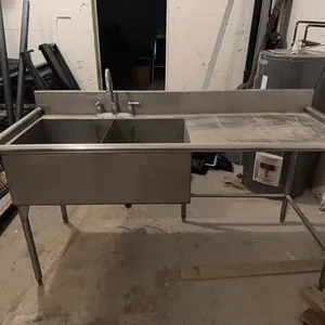 Stainless Steel Table / Sink, located downstairs