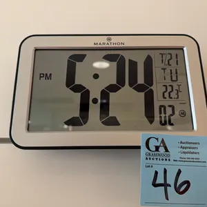Marathon digital clock with thermostat and date, approx 8” wide