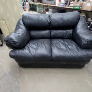 Black Leather Overstuffed Three-Seater Sofa 66”